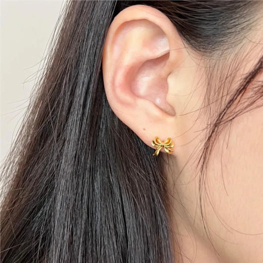 Little bows golden earrings