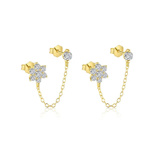 Pendientes dorados con cadena de flores brillantes