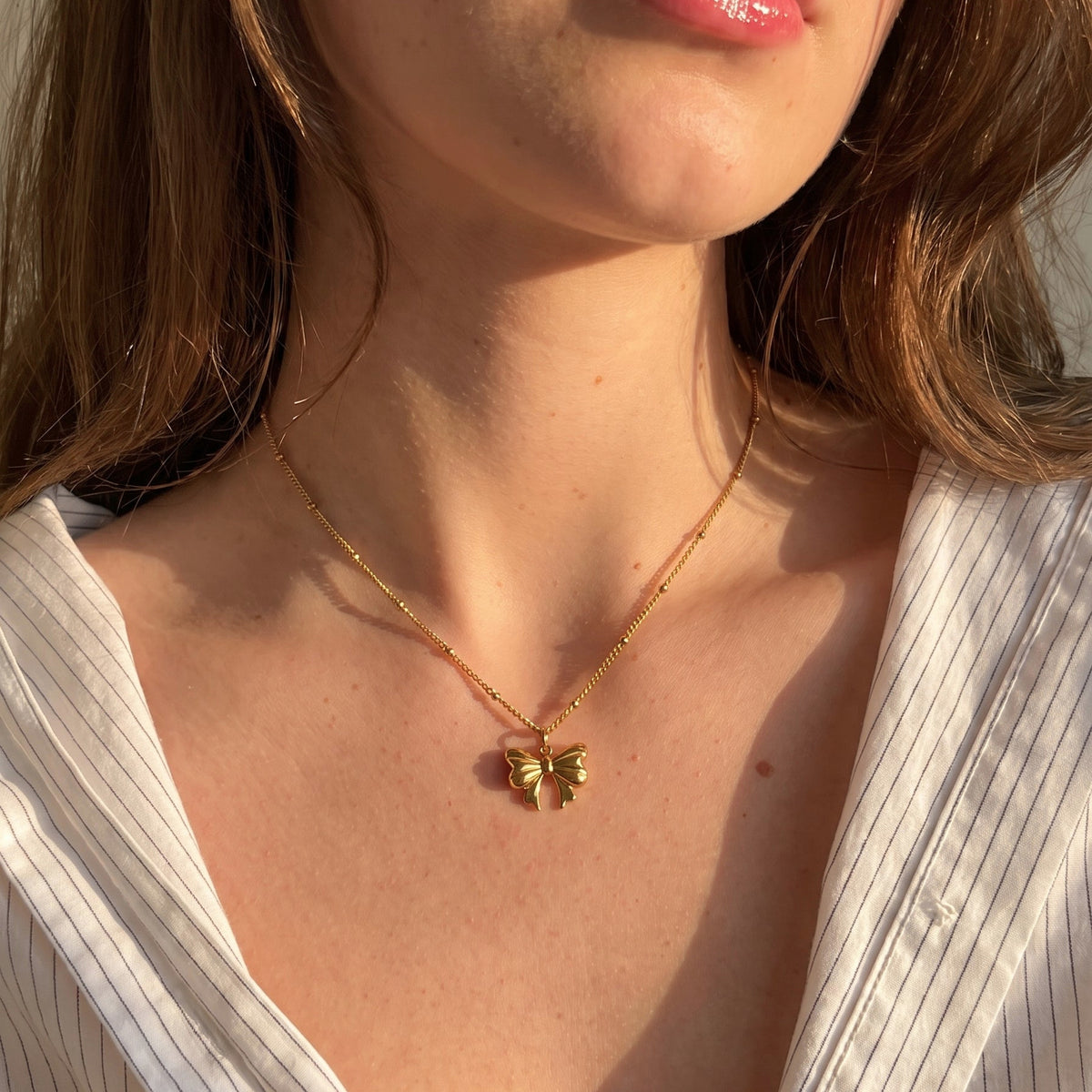 Coquette bow golden necklace💧