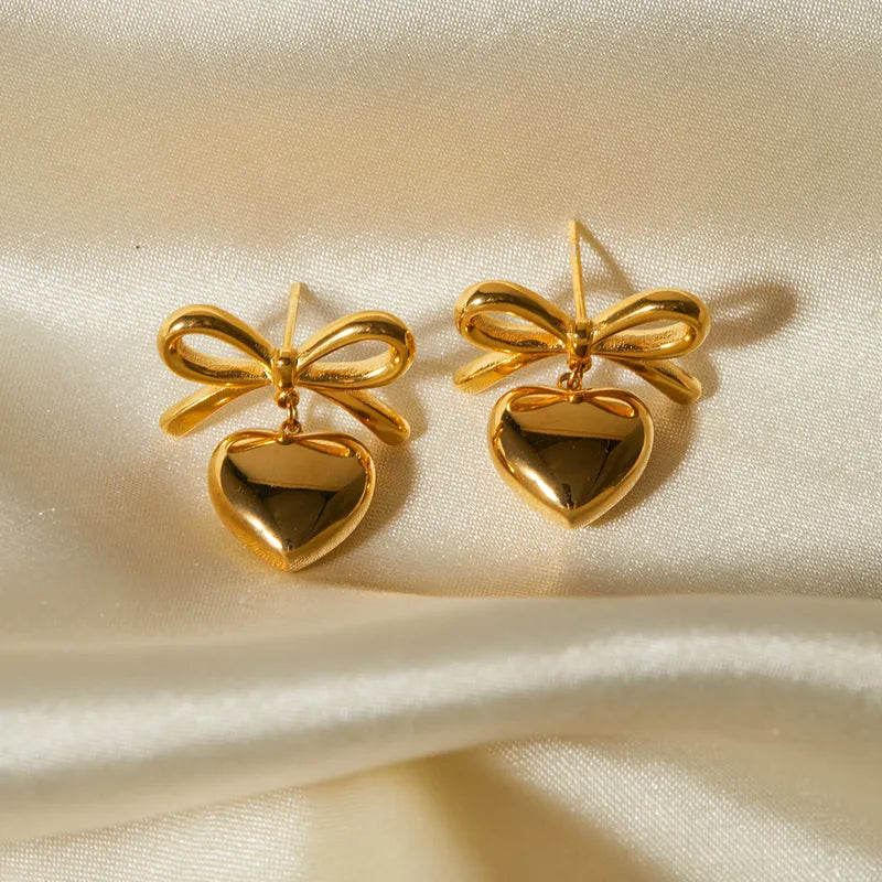 Bow & heart golden earrings